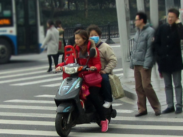 мотоциклистка, Китай, фото